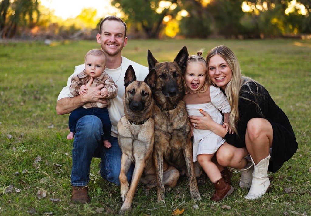 Coby and Sami Vandertoolen with their two kids and two dogs